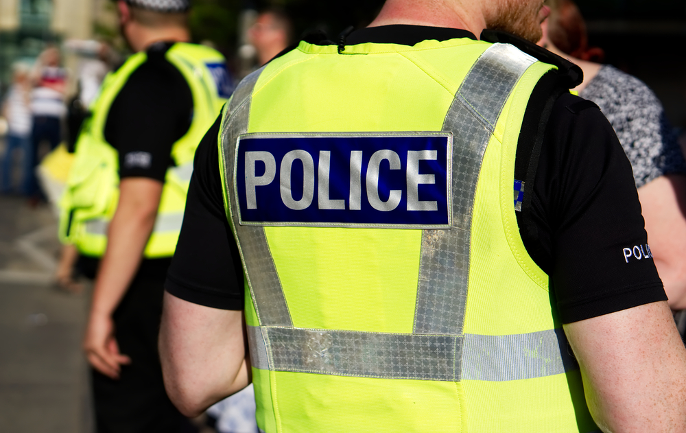 Police officer wearing yellow vest